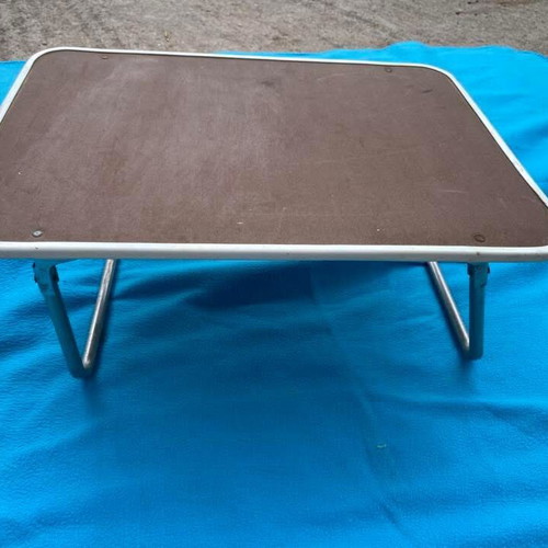 Lap tray with metal stands used