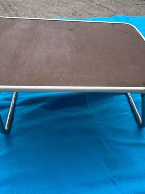 Lap tray with metal stands used