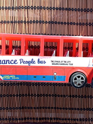 Red plastic bus toy vehicle