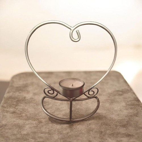 Decorative silver iron heart candle holder like new
