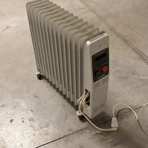 Victory oil radiator used, large with adjustable thermostat