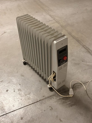 Victory oil radiator used, large with adjustable thermostat