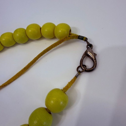Handmade yellow necklace with wooden beads and suede cord like new