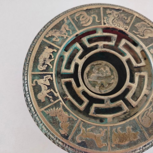 Metal incense burner used with decorative elements from the Chinese zodiac