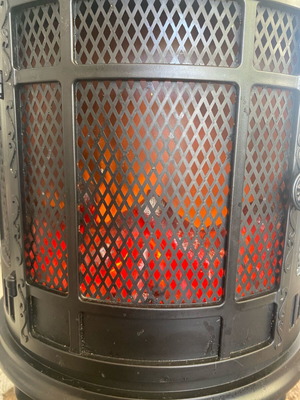 Decorative fireplace insert used with flame motion effect