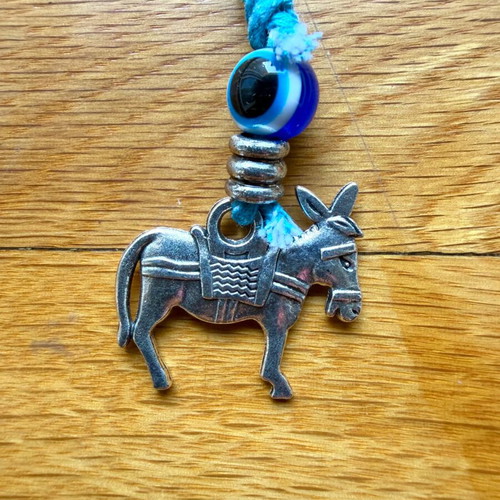 Donkey keychain like new with silver motif and blue eye bead