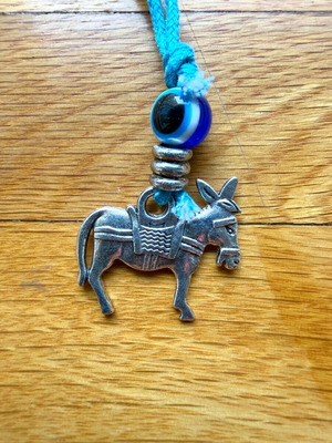 Donkey keychain like new with silver motif and blue eye bead