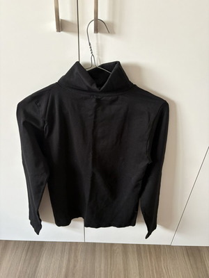 Black long-sleeve top with neck