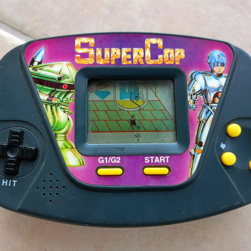 Super Cop Neda handheld electronic game used