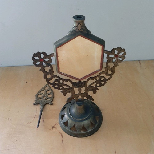 Bronze perfume holder with rotating mirror used