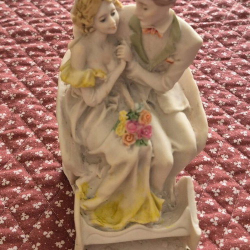 Figurine depicting a newlywed couple used