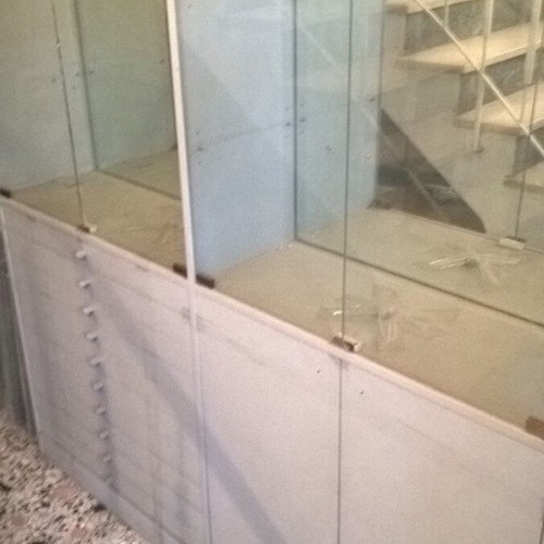 Display cabinet used with internal lighting, wood, lacquer and glass
