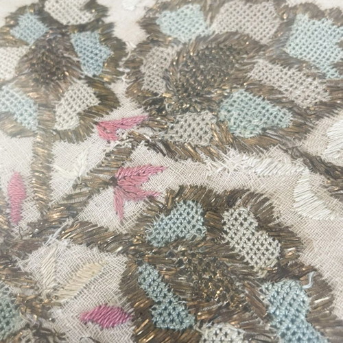 Silk handmade embroidery in aged gold and velvet frame