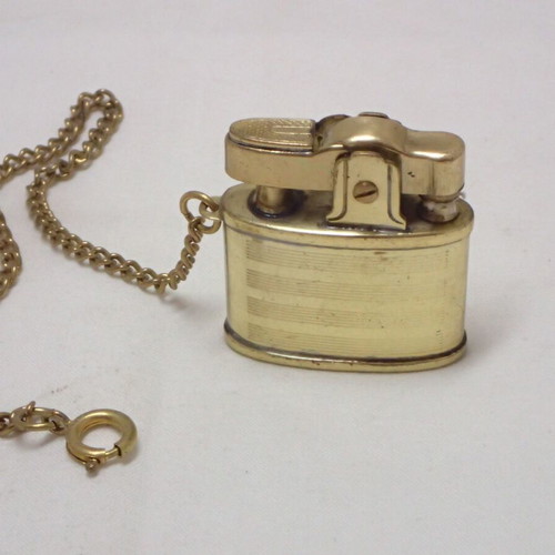 Vintage Penguin K Automatic Lighter made of brass, like new