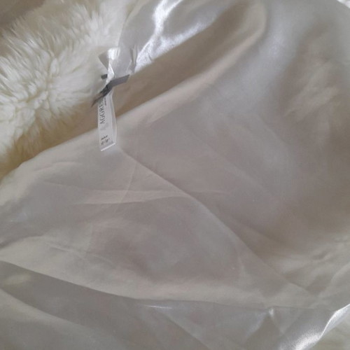 Polyester fur 100% like new for 9 to 10 years old