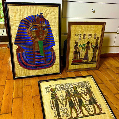 Set of framed real papyrus pictures with bronze or copper statue and marble lamp