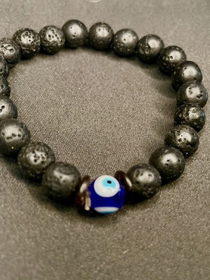 Unisex bracelet with evil eye and lava stone beads