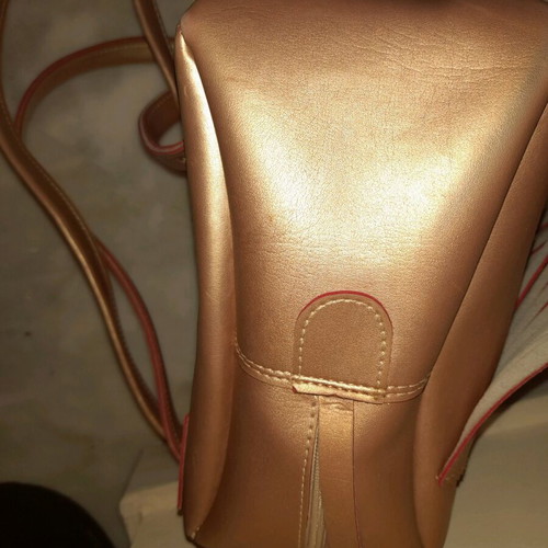 FRNC Backpack gold/bronze with fringes and matching pouch like new