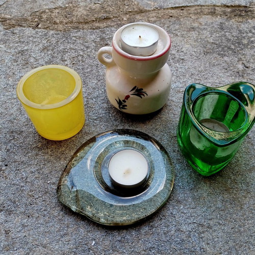 Set of various tealight holders, three glass and one ceramic