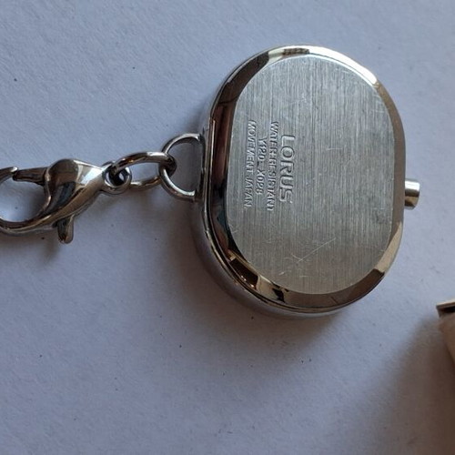 Lorus Quartz watch used, beige and silver, good condition