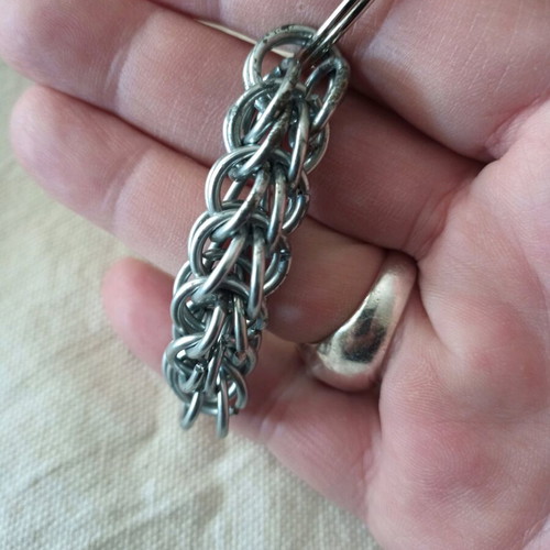 Steel keychain like new, Persian knot