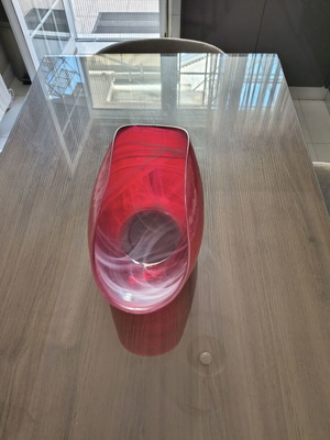 Handmade glass bowl like new with red and white swirl design