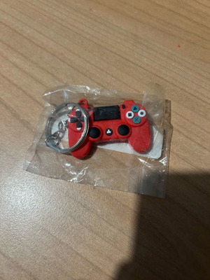 PlayStation controller keychain new, red, intact
