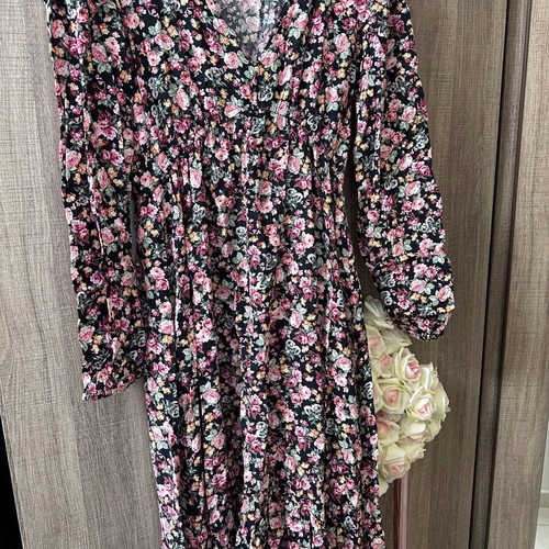 Dress used, size S, longer at back with floral pattern