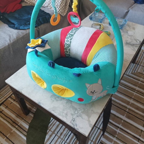 Baby seat with toys like new