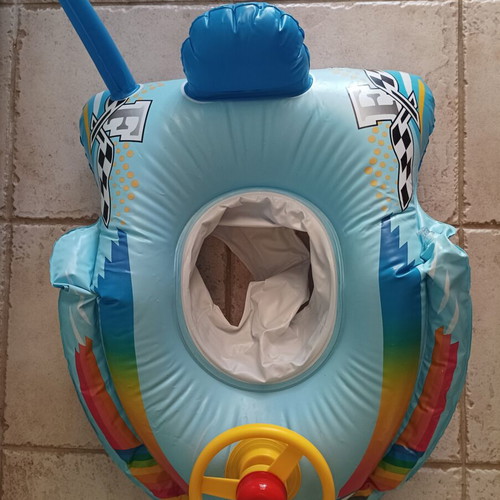 Inflatable car baby float used with leg holder