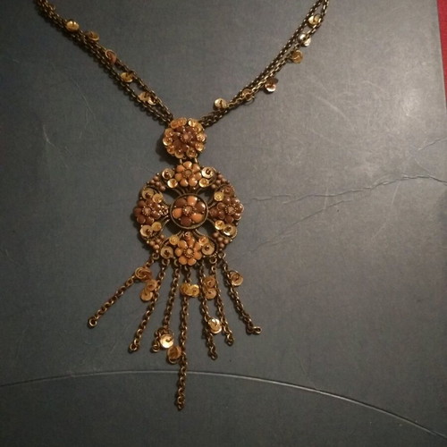 Boho style bronze pendant like new with sequins and beads