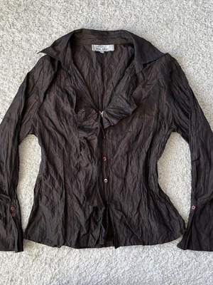 Brown shirt with gathers used