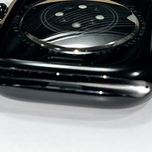 Apple Watch Series 11 46mm Demo Edition with compatible charger