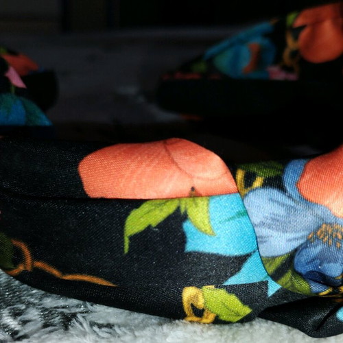 Satin style headband used, multicolor with flowers