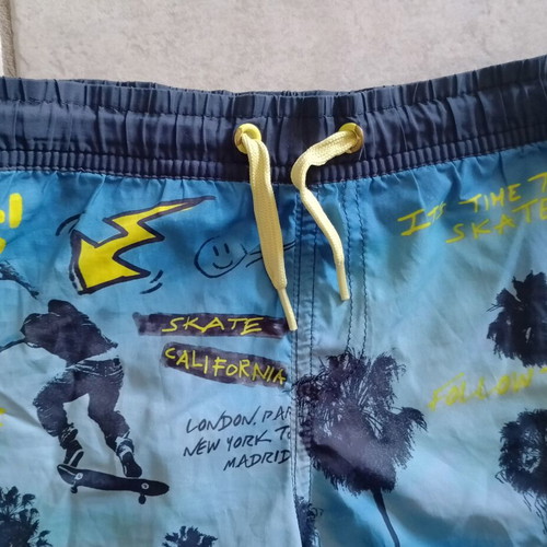 Losan boys' swim shorts used, size 104 cm, blue and yellow, skate theme