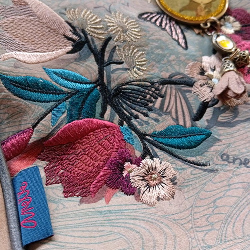 Anekke crossbody bag used with embroidery and keychain