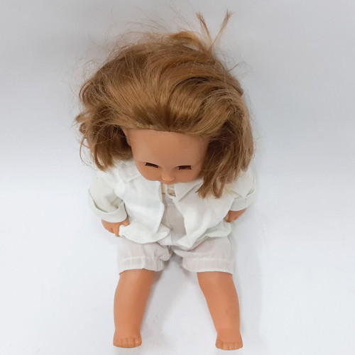 Vintage hard plastic doll with blue sleeping eyes, 1970s