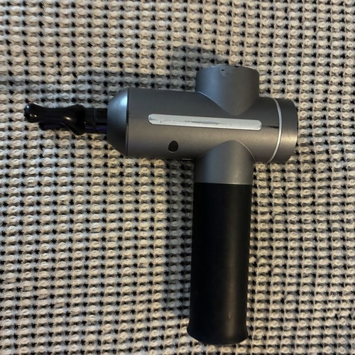 Massage gun used for muscle relaxation and stress relief