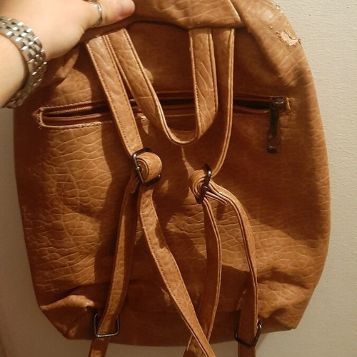 Backpack used with minor scratch on side