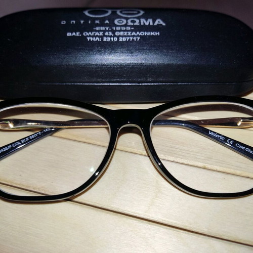 Valerio eyeglasses new, black with gold frame