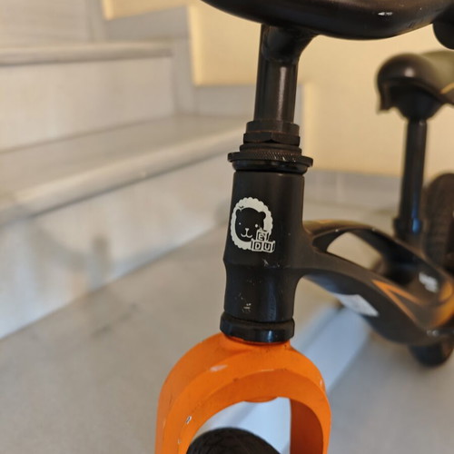 Lionelo Bart Air balance bike used, black orange