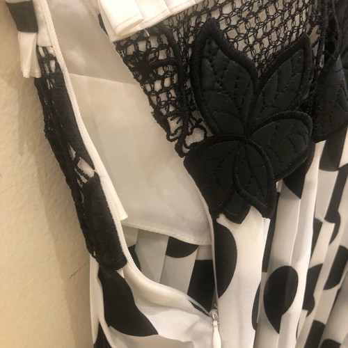Lucifair pants and top set like new, cream-black