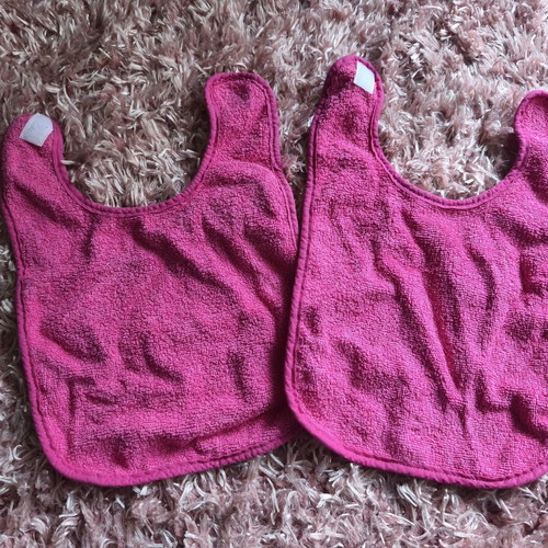 2 terry cotton fuchsia bibs like new
