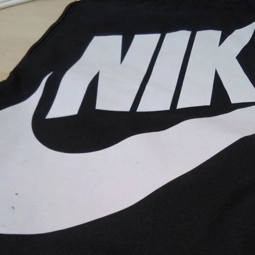 Nike unisex medium athletic drawstring bag used, black and white