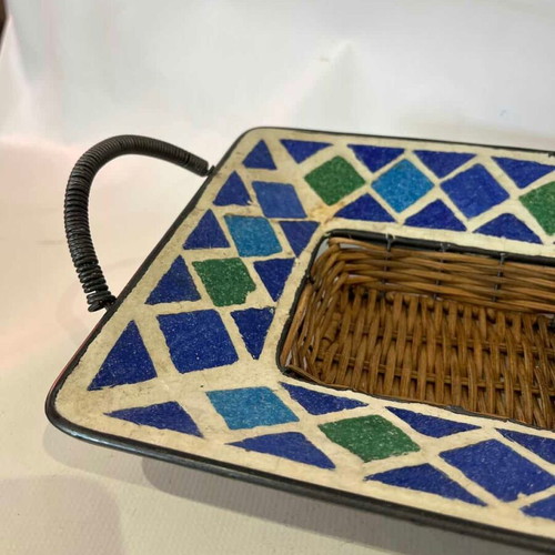 Vintage wicker basket with ceramic mosaic and metal handles used