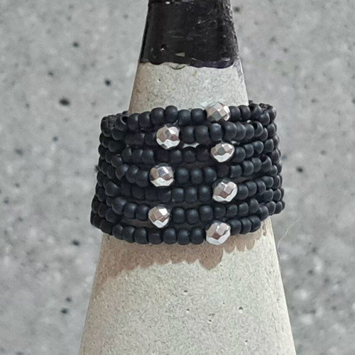 Handmade ring with black matte and silver polyhedral beads
