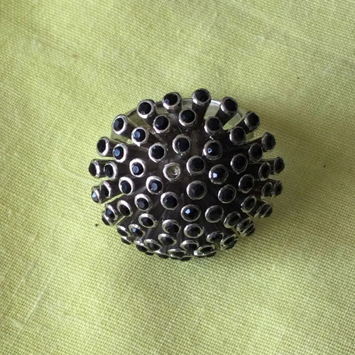 Mushroom-shaped ring with black stones like new