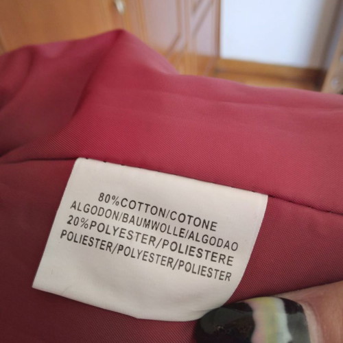 Black corduroy/velvet coat like new, size L/XL with colorful designs
