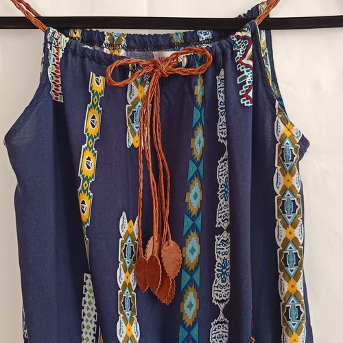 Sleeveless romper shorts like new, blue with patterns, size M