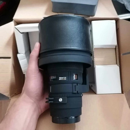 Sigma EF 300mm F2.8 HSM lens like new
